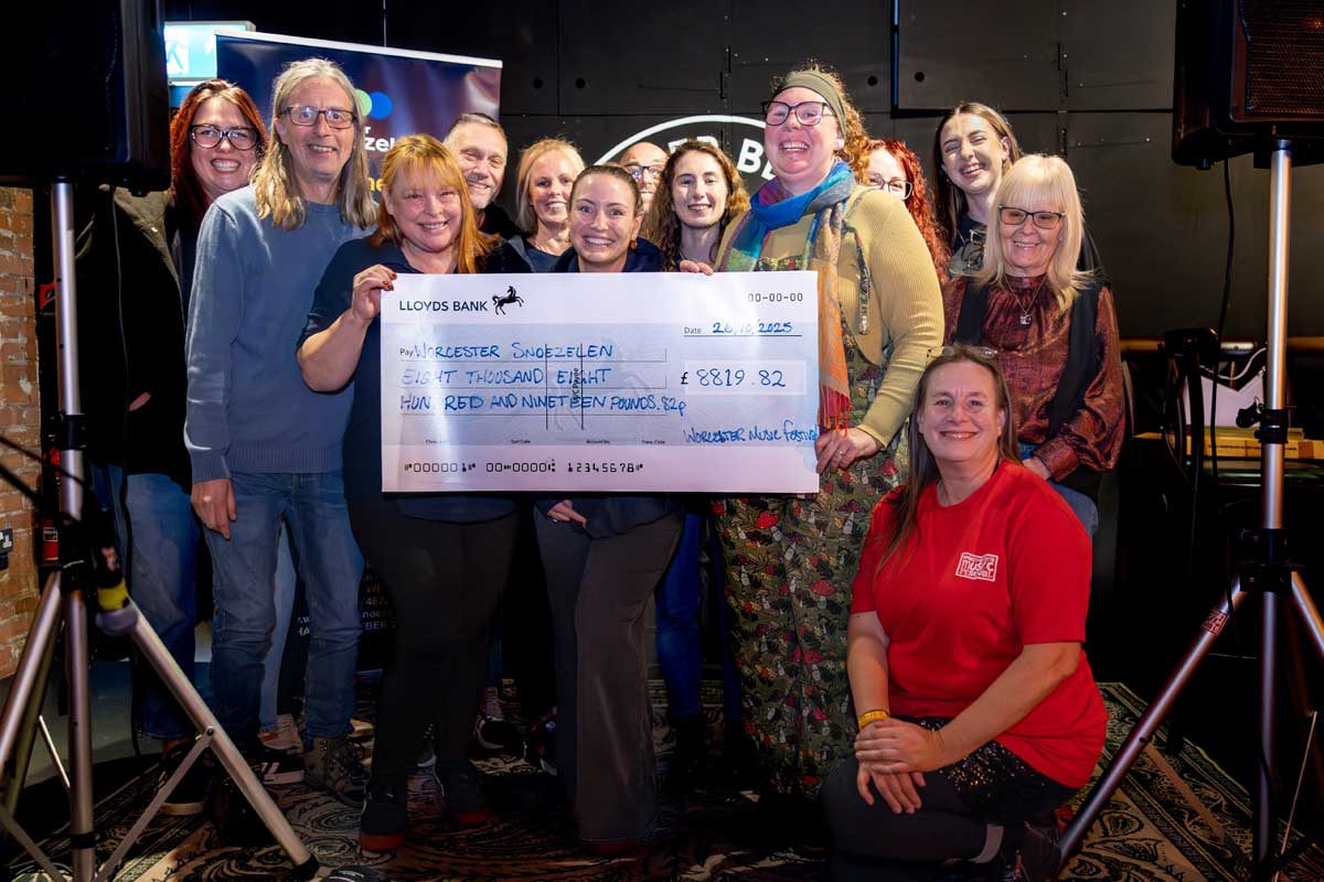 Photo of WMF charity team from 2025 being awarded a cheque
