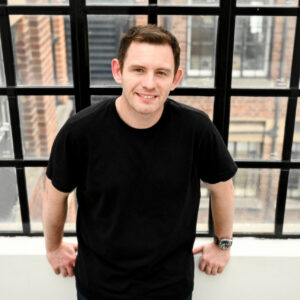 James stood infront of a Window